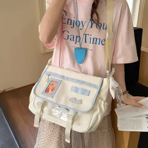 Japanese ins style canvas messenger bag for women, cute student crossbody bag with clear window.