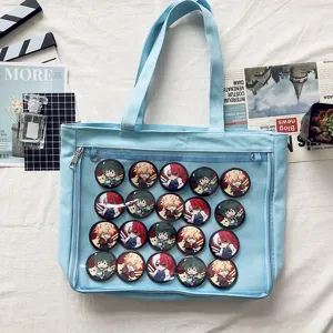 Japanese style canvas ita bag shoulder tote with clear front pocket for anime pins and dolls.