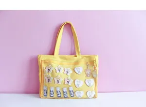 Yellow canvas ita bag with clear window, perfect for anime pins, plushies and daily casual wear.