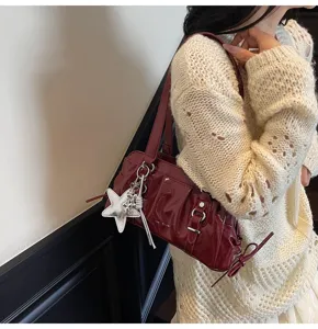 Solid color casual patent leather shoulder bag with chic pleated design and stylish star pendant.
