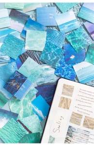 Detail view of MoCard square memo sticker book, ocean landscape washi stickers for journaling.