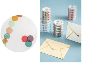 Detail shot of PET circle washi tape, featuring colorful dotted patterns and journal stickers.