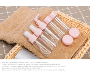 Travel toiletry bottles set refillable cosmetic containers for shampoo and lotion.