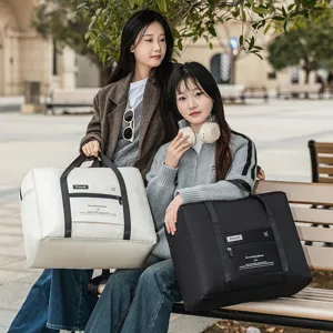 Grand sac de voyage pliable et sac a main pour voyages d'affaires fitness et rangement quotidien.