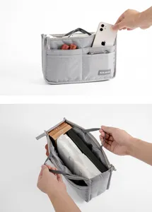Grijs vilt handtas organizer inzetstuk meerdere zakken reizen make-up cosmetische tas.