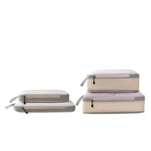 Kompression Reise Packtaschen Set beige Netztaschen für perfekte Koffer Organisation.