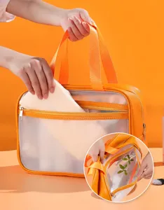 Clear travel toiletry bag with large capacity, dry wet separation design, orange cosmetic bag detail.