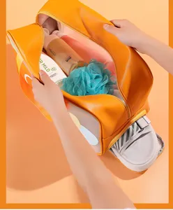 Large capacity waterproof travel toiletry bag with separate shoe compartment and clear design.