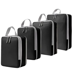 Set van 4 zwarte compressie inpakblokken reiskoffer organizers met ritssluiting en handvat.