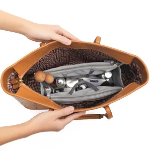 Brown tote bag with grey felt organizer insert, large capacity travel cosmetic storage.