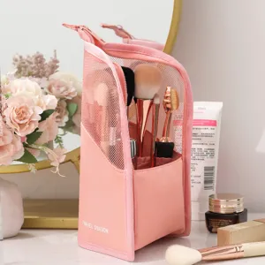 Pink standing travel toiletry bag, portable mesh makeup brush organizer pouch for daily use.