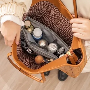 Portable felt bag in bag organizer insert with double zippers for tote purses and travel use.