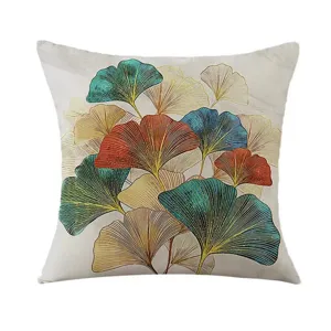 Detail view of a modern minimalist ginkgo leaves pattern decorative square throw pillow cover.