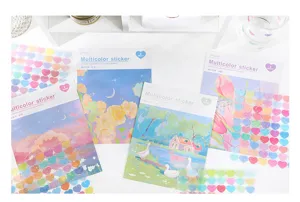 Close-up detail of aesthetic starry sky and landscape PET sticker sheets with shiny glitter.