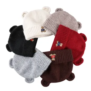 Cute bear ear knit beanie for women, warm winter plush embroidered hat, casual daily wear.
