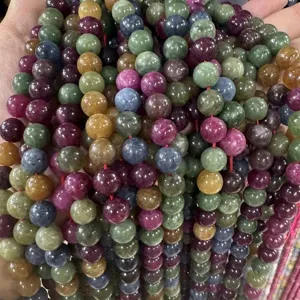 Multi-color natural gemstone round beads detail shot, perfect for DIY handmade bracelets and jewelry making.
