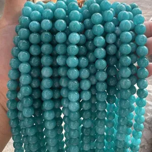 Detail shot of blue natural stone loose round beads for DIY bracelet jewelry making accessories.