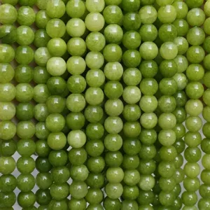 Green natural stone loose round beads detail shot for DIY bracelet jewelry making accessories