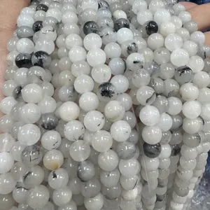 Natural stone bead detail shot, black and white round beads for DIY bracelet accessories supply.