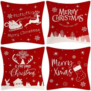 Christmas linen pillow cover detail showing festive red cushion with white deer and tree patterns.