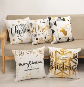 Christmas throw pillow covers set with gold foil deer and snowflake prints for home decor.