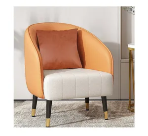 Modern luxury accent chair detail view with leather cushion, elegant living room decor.