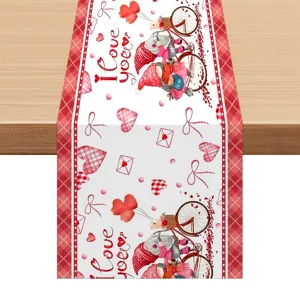 Valentine table runner detail shot, red plaid border with sweet gnome and heart print.