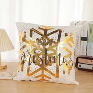 Christmas throw pillow cover with golden snowflake print, festive home decor cushion.