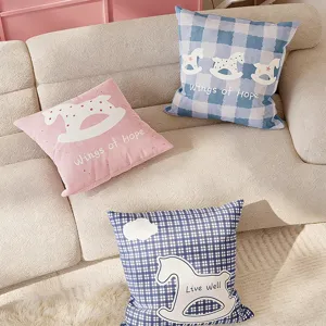 Cream style sofa throw pillow set with cute rocking horse pattern, soft cushion for home decor.