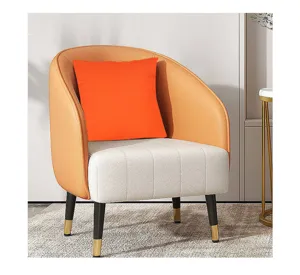 Close up of vivid orange plush throw pillow detail, soft textured fabric for modern decor.