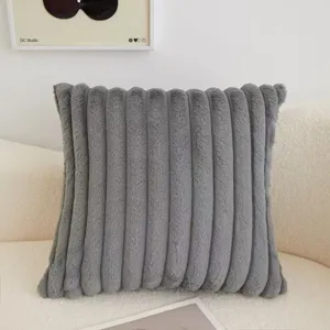 Grey striped faux fur throw pillow, soft plush cushion for sofa, living room home decor.