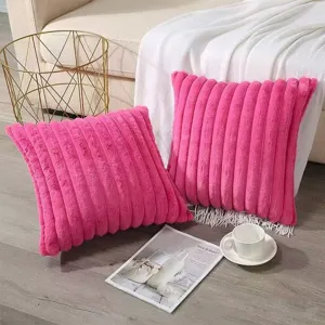 Pink plush strip throw pillow detail showing soft texture and cozy home decor styling.