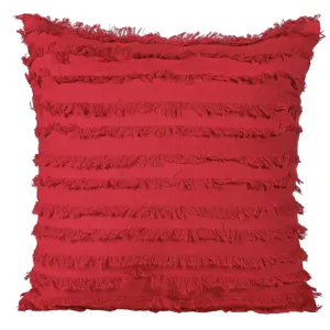 Detailed view of the red boho throw pillow cover featuring stylish horizontal fringe textures.