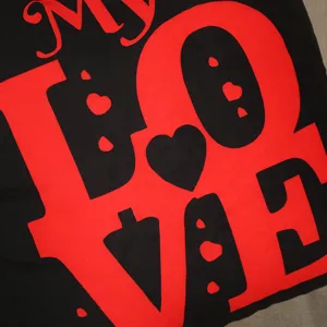 Black and red Valentine's Day cushion cover with LOVE text for modern sofa and bed decor.