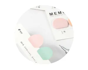 Close-up detail of pastel aesthetic memo sticky notes with creative backing cards.