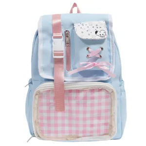 Zaino azzurro carino con spallacci rosa e tasca trasparente ideale per l'uso quotidiano.