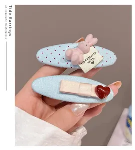 Korean fabric oval BB hair clip with cute polka dot bunny and heart design for sweet girls.