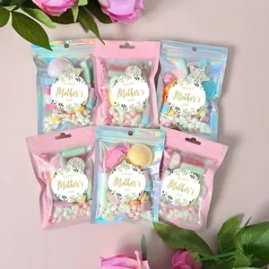 Mother's day gift bags with decorative gold foil stickers, perfect for party favors and treats.