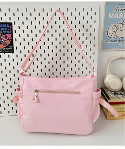 Pink canvas shoulder bag versatile messenger bag large capacity casual crossbody bag for daily use