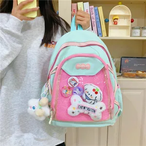 Cute Japanese style ita backpack with clear front pocket, pastel colors and cute plush charms.