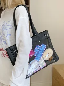 Detail view of black transparent ita bag, Japanese style shoulder tote with clear pins.