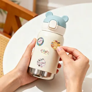 Cute cartoon bear ear stainless steel vacuum thermos water bottle with sweet donut stickers.
