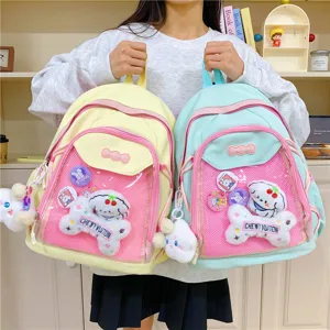 Japanese style cute transparent ita backpack with clear front pocket, plush charms and pins.
