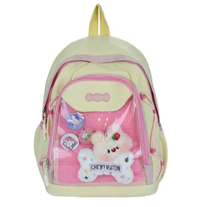 Cute yellow pink ita bag backpack with transparent front pocket, perfect for cute pins and plush toys.