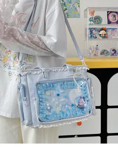 Bonito bolso ita azul claro con ventana transparente y volantes de encaje para anime.