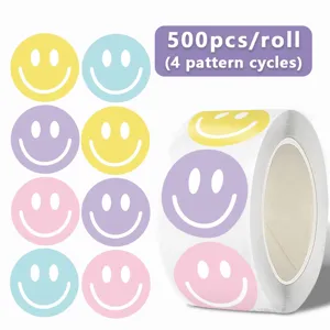 Colorful smiley face reward roll stickers, 500 pcs per roll with four pattern cycles.