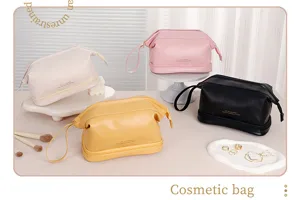 Detail view of large capacity PU leather cosmetic travel bag in multiple colors with handle.