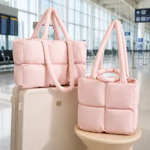 Pink puffy quilted tote bag, soft padded shoulder handbag for daily fashion and travel.