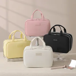 Large capacity multi-layer portable cosmetic bag travel makeup organizer and storage bag.