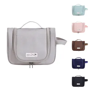 Portable hanging travel toiletry bag with multiple color variants for cosmetics and daily essentials.